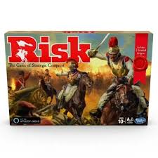Boite du Jeu Risk avec des figurines d'armées colorées et des dés de combat